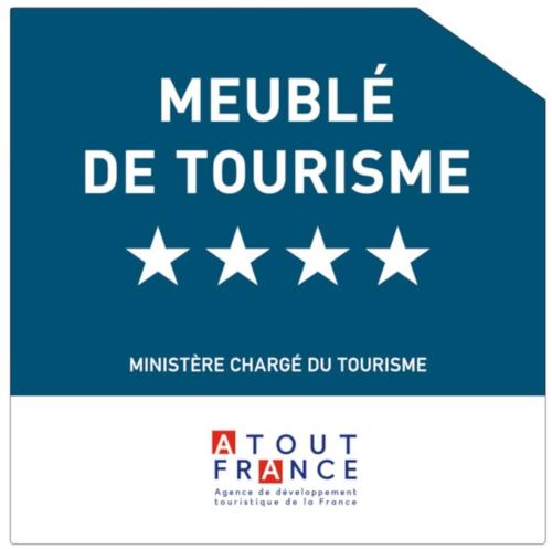 a blue sign with white stars and the text module de tourism at La Maison Bleue en Iroise - Randonnées GR34 - Plage 10 min à pieds - wifi, vélos VAE gratuits, jardin - Exposition plein Sud in Loc-Maria-Plouzané