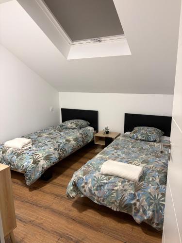 Llit o llits en una habitació de Stella appartement