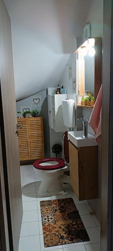 a bathroom with a toilet and a sink at Thalassa in Panayía