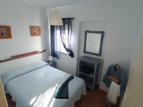 Llit o llits en una habitació de BOL16