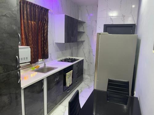 Kuchyň nebo kuchyňský kout v ubytování Residence Fatimah