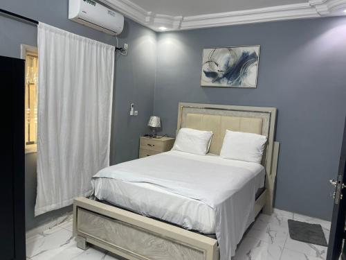 Postel nebo postele na pokoji v ubytování Residence Fatimah