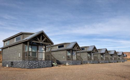 a row of houses lined up in a row at Page Lake Powell Campground - Tiny Home King Room in Page