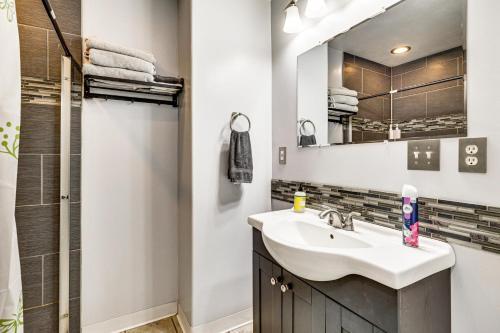 a bathroom with a sink and a mirror at Secluded Albany Escape, Pet Friendly w/ Fee in Albany