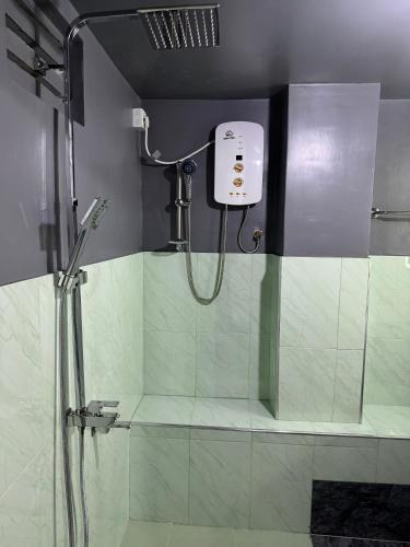 a shower stall in a bathroom with a shower at Dilco Villa Ahangama in Ahangama