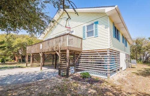 a house with a porch with a deck at Landing Pad - Kill Devil Hills, Oceanside, 350 Yards to Beach, Flex Stays, 4 BR in Kill Devil Hills