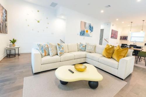 a living room with a couch and a coffee table at Elite Galleria Luxe World Cup in Houston
