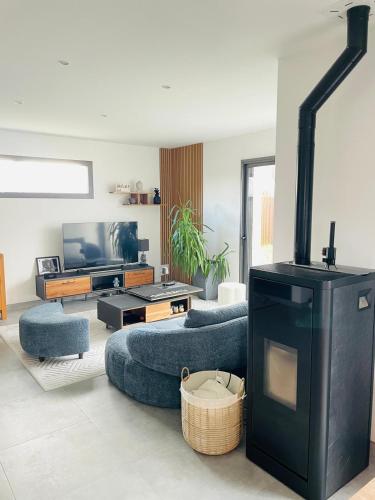 Posezení v ubytování Agréable maison moderne