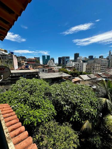 a view of a city with trees and buildings at Casa Selarón - Lapa centro in Rio de Janeiro