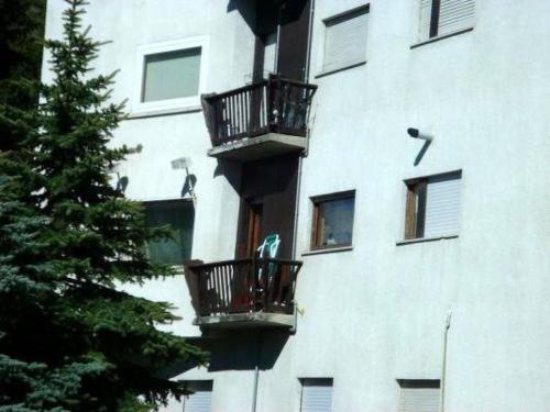 a building with balconies on the side of it at Apartment 'Il Capriolo by Interhome in Sauze d'Oulx