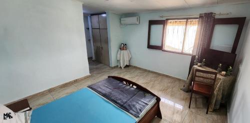 an overhead view of a room with a pool at Chez Rossa à Deido in Douala