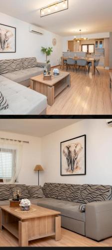 a living room with a couch and a table at House Calmaria in Novigrad Dalmatia