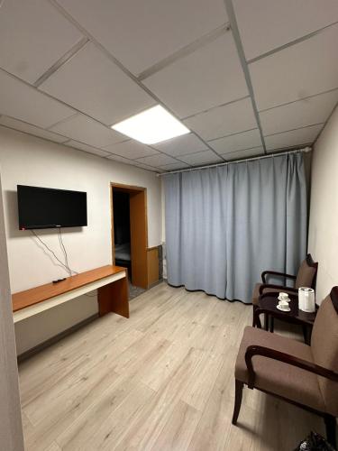 TV tai viihdekeskus majoituspaikassa Sod hotel