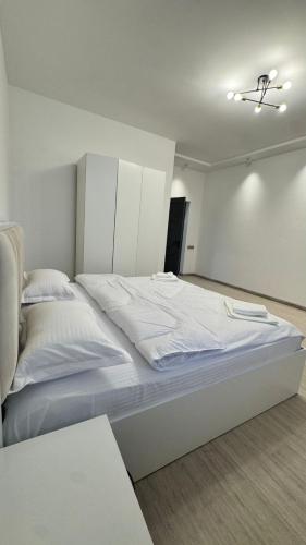 Postel nebo postele na pokoji v ubytování Prime House