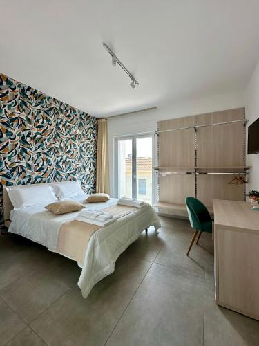 Vuode tai vuoteita majoituspaikassa B&B Raphaël