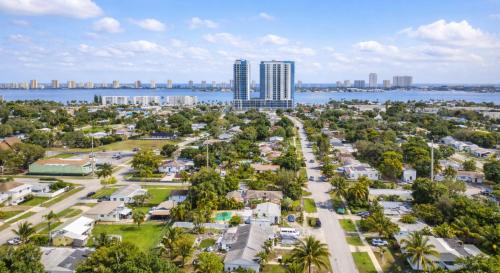 an aerial view of a park in front of a city at Family-Friendly Beach Home in West Palm Beach, FL in West Palm Beach