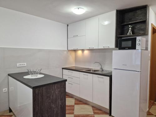 Apartment Modern eingerichtete Apartment für 4 Personen ideal für Famillien mit Kinder im by Interhome