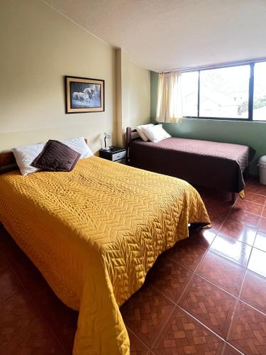 Krevet ili kreveti u jedinici u okviru objekta Chapelet Hostal