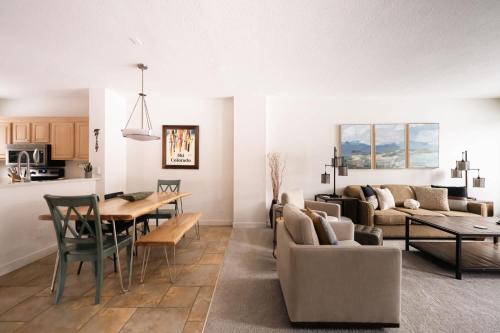 a living room with a couch and a table at Lakefront Keystone Escape - Near Slopes & Trails in Keystone