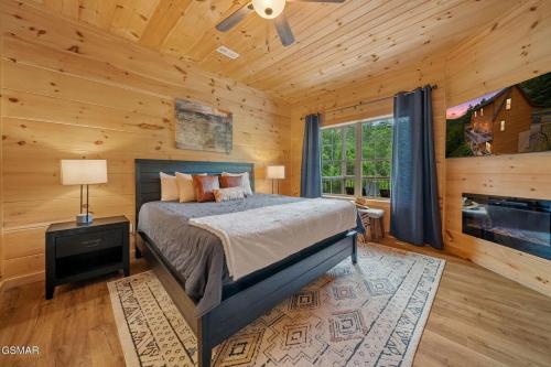 a bedroom with a bed in a log cabin at Cabin in Sevierville in Sevierville
