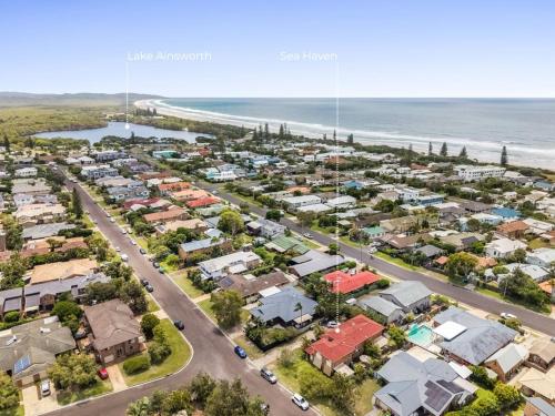an aerial view of a suburb next to the beach at Sea Haven in Lennox Head