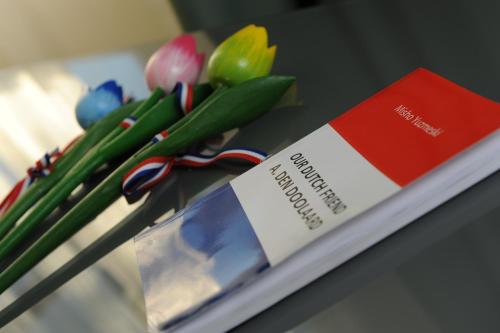 a book with a nameplate and some at Millenium Palace in Ohrid