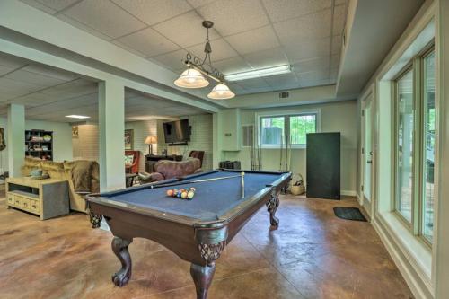 a living room with a pool table in it at Dockside Lakefront Escape Deck Views in Jacksons Gap