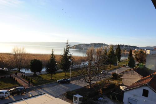 arial view of a city with a body of water at Millenium Palace in Ohrid