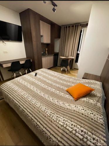 Llit o llits en una habitació de Hospedate HD