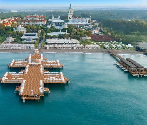 an aerial view of a resort on a body of water at Swandor Hotels & Resorts - Topkapi Palace in Lara