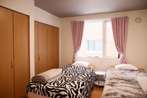 札幌 rakuna inn 鈴