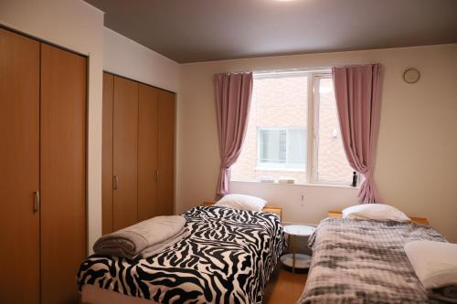 札幌 rakuna inn 鈴