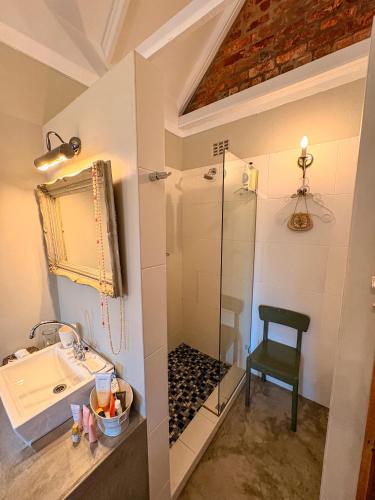 a bathroom with a shower and a sink at Winner in the Overberg in Bredasdorp