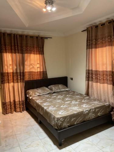 En eller flere senger på et rom på Spec Apartment