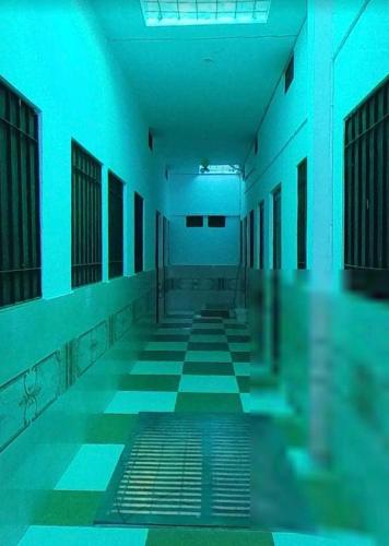 an empty swimming pool with blue lights in a building at Hotelthemarwarexcellency in Jodhpur