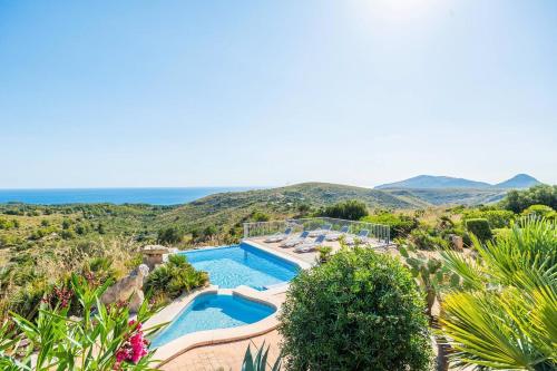 an image of a villa with a swimming pool at Ca na Moli in Artá