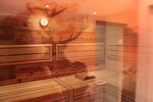Koupelna v ubytování Wellness & Ayurveda Hotel Am Eichenberg