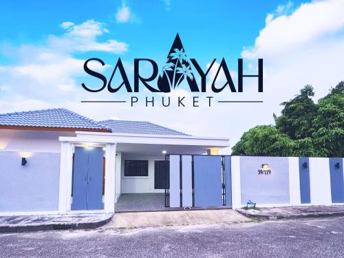 a white house with the words sarani phuket at Sarayah Phuket 4Bed Villa in Ban Tha Rua