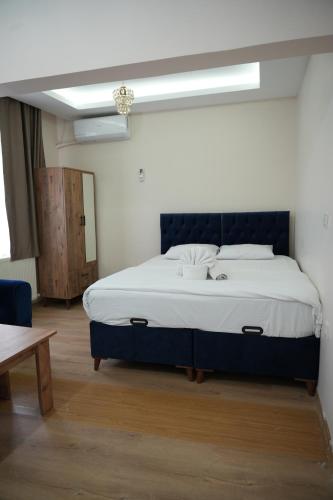a bedroom with a large bed in a room at BDK hotel in Istanbul