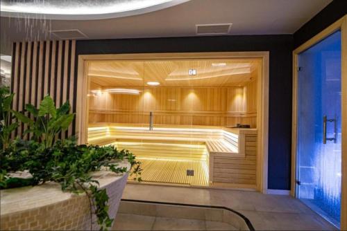 a large room with a sauna in a building at Zlatibor 2 in Zlatibor