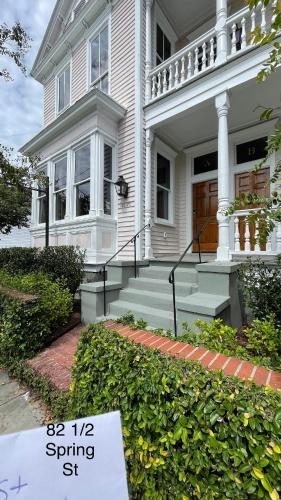 a for sale sign in front of a house at The Juliette - Luxury Historic Residence in Charleston