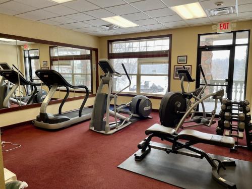 a gym with several treadmills and elliptical machines at Unit 411A 1 Bd 1 Ba Condo Condo in Birchwood