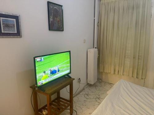 Et tv og/eller underholdning på Apartment Dinos