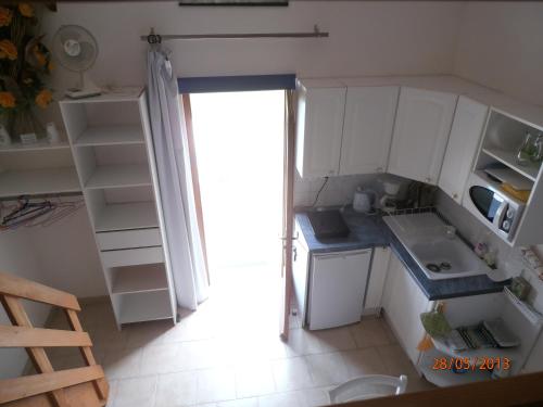 Η κουζίνα ή μικρή κουζίνα στο Studio-mezzanine dans villa