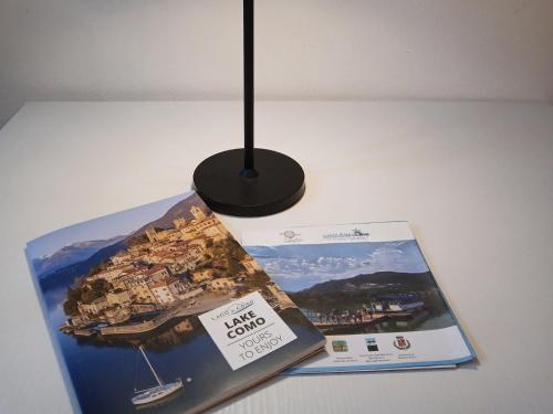 a book sitting on top of a table at Il monolocale in Bosisio Parini