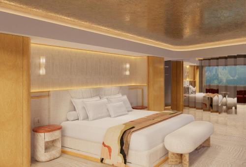 a bedroom with a large white bed and a room at Hotel Londres in Caracas