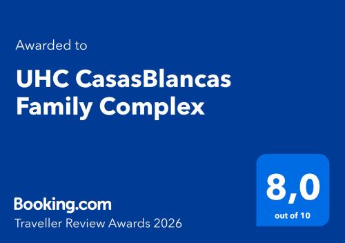 a blue sign with the words ufc casas blanca family complex at UHC CasasBlancas Family Complex in Salou
