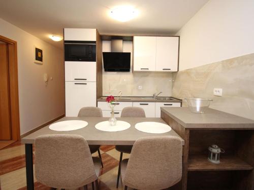 Apartment Modern eingerichtete Apartment für 4 Personen ideal für Famillien mit Kinder im by Interhome