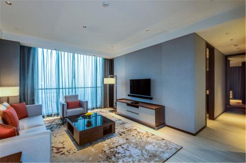Μια τηλεόραση ή/και κέντρο ψυχαγωγίας στο Oakwood Residence Damei Beijing
