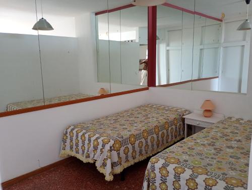 Apartamento playa Canteras y piscina